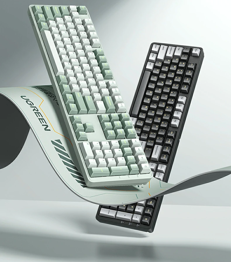 绿联KU103键盘轻音红轴特写，4.0mm行程与45g触发压力带来顺滑低噪体验